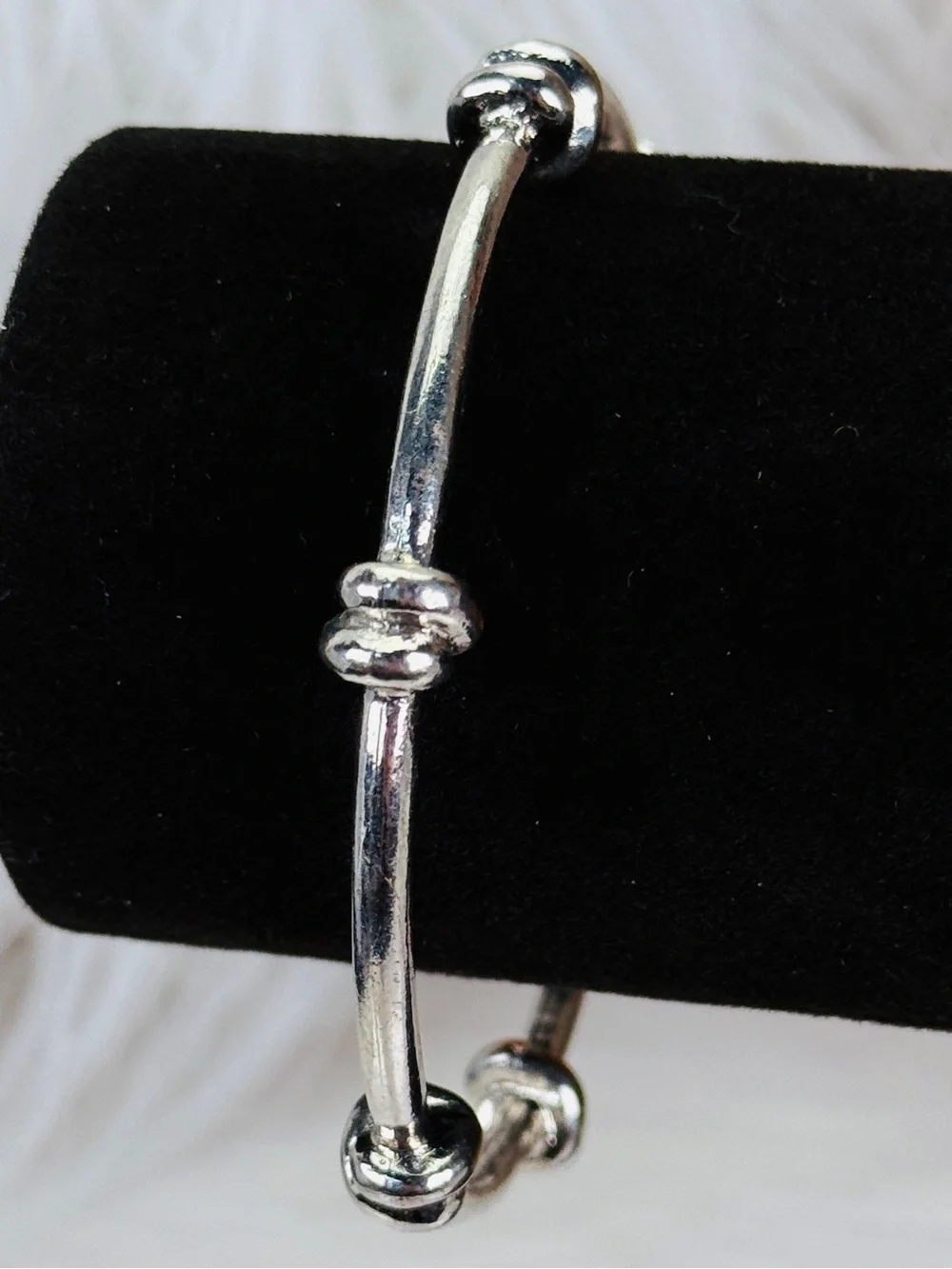 Pretty Silvertone weighted knotted bangle stacking bracelet